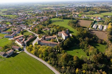 Fototapeta na wymiar Aerial shot of the medieval Castello di Villalta in Friuli Italy with the town in the background