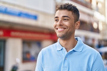 Fototapeta premium African american man smiling confident standing at street