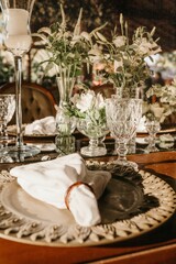 Interior of a restaurant with white tablecloths and dishes