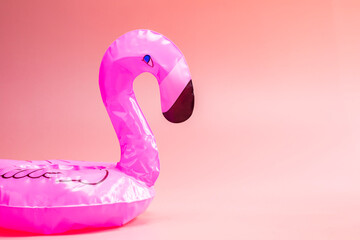 Inflatable Flamingo on a pink background, summer background,pool float party, trendy summer concept