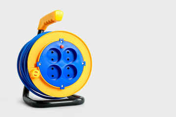 Extension electric cable reel isolated on white background