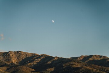 Landscape shot of mountains in Spain under the full moon