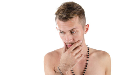 Obraz premium Young attractive man posing in the studio. White background.