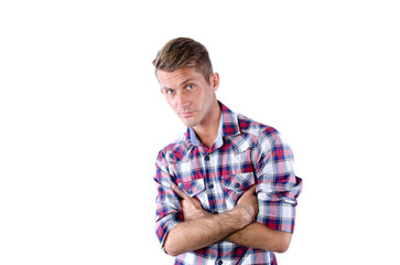 Young attractive man posing in the studio. White background.