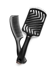 Naklejka premium Professional hair brushes on white background