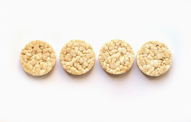 Healthy puffed rice cakes isolated on white