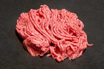 Minced meat on a gray table