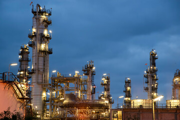 Fototapeta na wymiar Oil refinery plant chemical factory and power plant with many storage tanks and pipelines