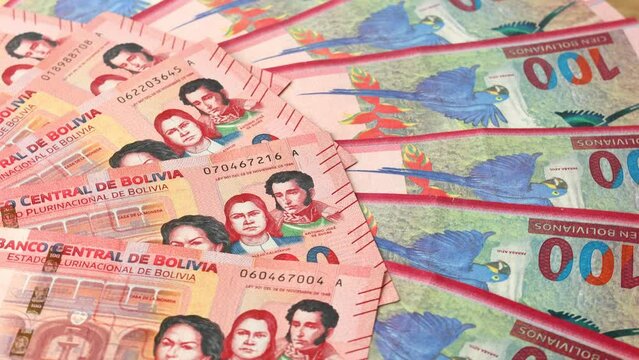 Bolivia currency rotating, A lot of money, Financial concept Lottery, wheel of fortune, financial success