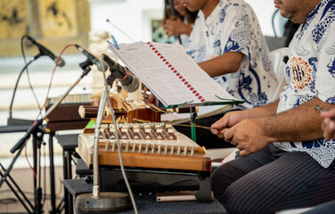 Street musicians play authentic Asian musical instruments