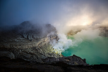 The acidic turquoise crater lake of Mount Ijen at sunrise, East Java, Indonesia, Asia