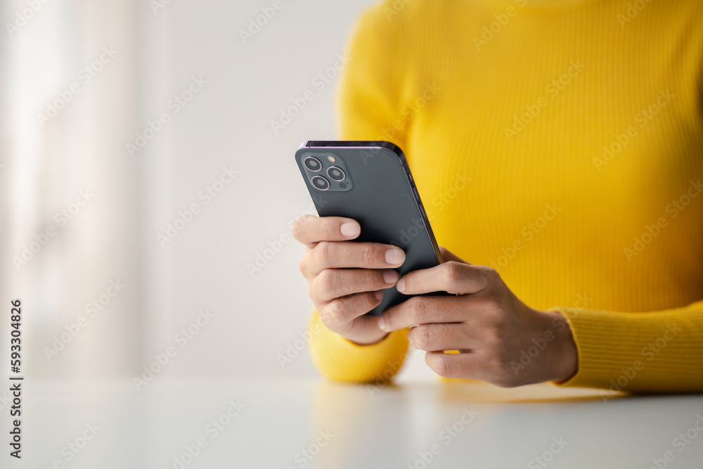Poster a person holds a mobile phone to use social media on a smartphone, communicating via the internet on
