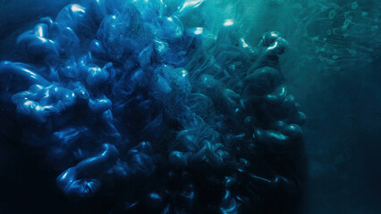 Fluid drop. Paint water. Explosion fume. Blue green color ink smoke cloud splash glitter dust particles texture dark abstract art background.