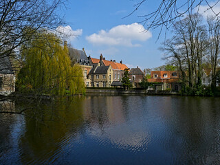 Fototapeta na wymiar Bruges, April 2023: Magnificents facades of the buildings of Bruges, the Venice of the North