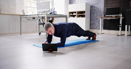 Man Doing Office Plank Exercise Workout