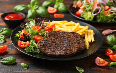 Peppered Vegetarian steaks served with french fries and salad