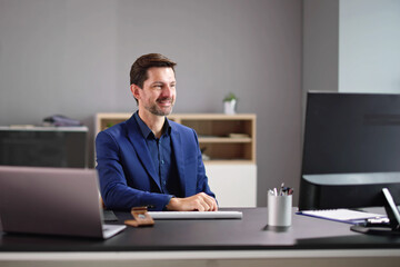 Businessman Having Ah Ha Moment While Working In Office