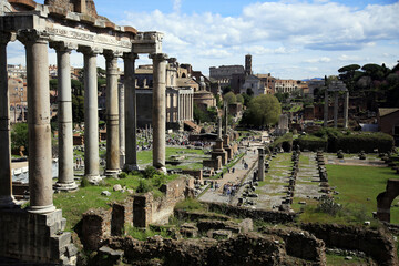 The Roman Forum with the Temple of Saturn, the esplanade of the Basilica Giulia, the columns of the...