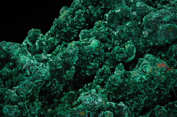 Malachite. green macro detail texture background. close-up raw rough unpolished semi-precious...