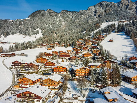 Aerial view Alpbach town in Kufstein, Tirol. Austria by drone. Alps mountains. Winter. Snow.