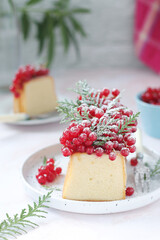 A biscuit decorated with red currant