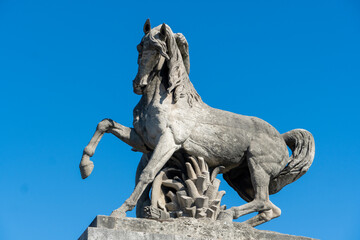 French historic statue of horse on the streets by Eiffel Tower in Paris, France