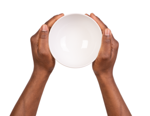 Man holding an empty white bowl in hands, isolated on white or transparent background, top view