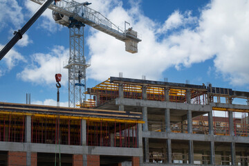 Construction of a high-rise building. Construction of new houses in a big city.