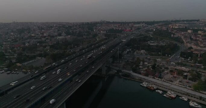 Aerial video flying over a bridge at sunrise in Istanbul
