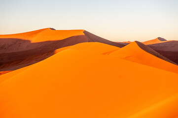 Fototapeta na wymiar Exterior shot of the Namibian Sossusvlei sanddunes near the famous Dune 45 around sunrise