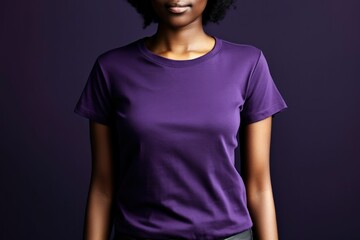 Black woman model wearing a plain purple short sleeved t-shirt, isolated on a blank background. Mock-up, torso only. Generative AI illustration.