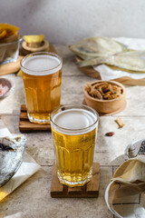 beer with dried fish and nuts