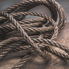 Texture of jute rope close-up. Twisted coarse rope. A skein of jute. Natural material for decoration. Textile cord. Small rope.