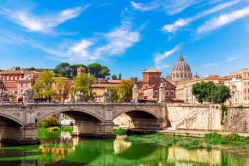 Fototapeta na wymiar The Aelian Bridge over the Tiber River and St Peter's Cathedral, Rome, Italy