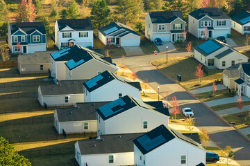 Aerial view of tightly located new family houses in South Carolina suburban area. Real estate development in american suburbs