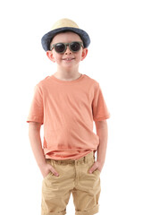 Little boy in fashionable clothes have a fun in photo studio.