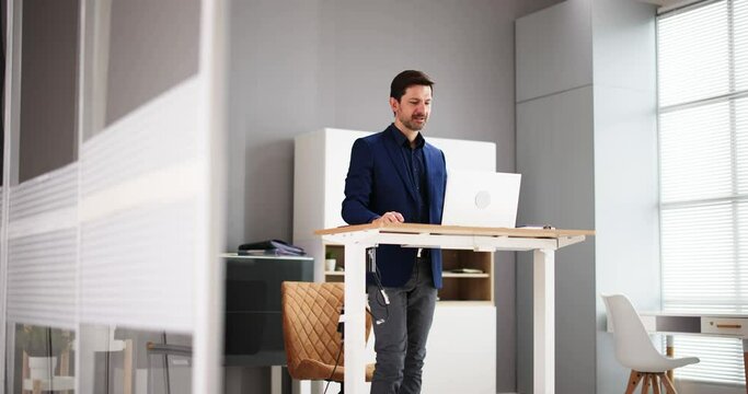 Adjustable Height Desk Stand In Office