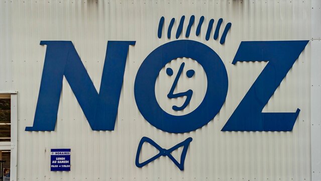 Blue logo of NOZ store on white background in Coulommiers, France