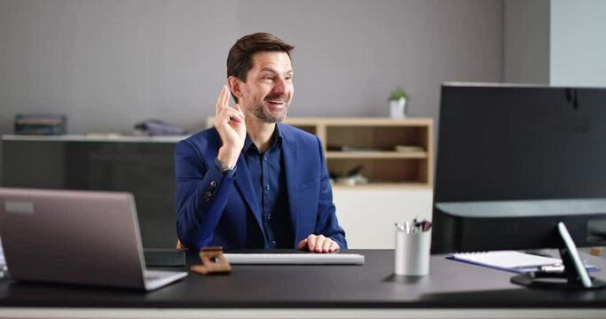 Businessman Having Ah Ha Moment While Working In Office