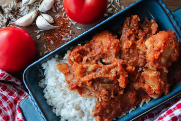Tomato bredie or stew. South African traditional stew made with tomatoes and meat