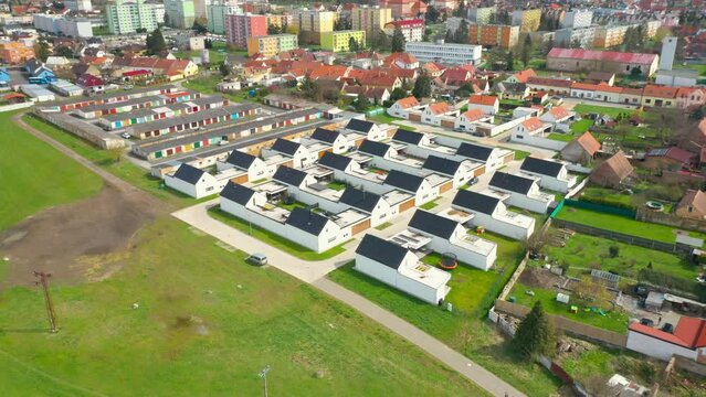 Suburban district houses from above. Passive buildings full of modern technologies for sustainability. Housing for a young progressive generation.