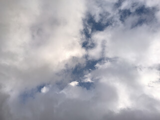 The whitish clouds are forming cracks