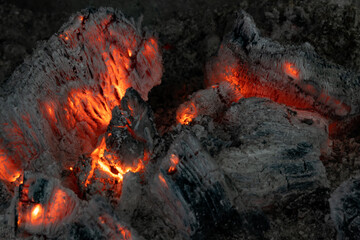 Wood fire. Burning embers with bright color. Wood fire with hot embers and ashes. Background...
