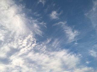 Naklejka na ściany i meble Abstract cloud wave is going to engulf the sky