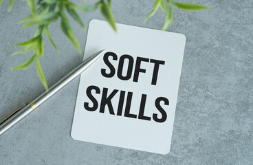 Soft Skills text on paper notepad, gray background