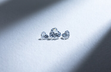 The process of appraisal of diamonds at the workplace of buyer during the action. High quality photo