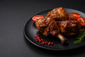 Delicious grilled chicken legs with spices and herbs in teriyaki sauce
