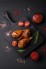 Delicious grilled chicken legs with spices and herbs in teriyaki sauce