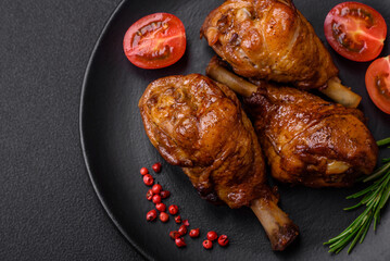 Delicious grilled chicken legs with spices and herbs in teriyaki sauce