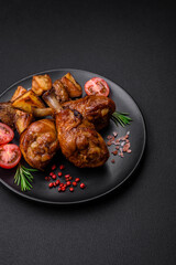 Delicious grilled chicken legs with spices and herbs in teriyaki sauce